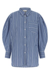 the ganni striped shirt redefines the codes of everyday tailoring through unexpe