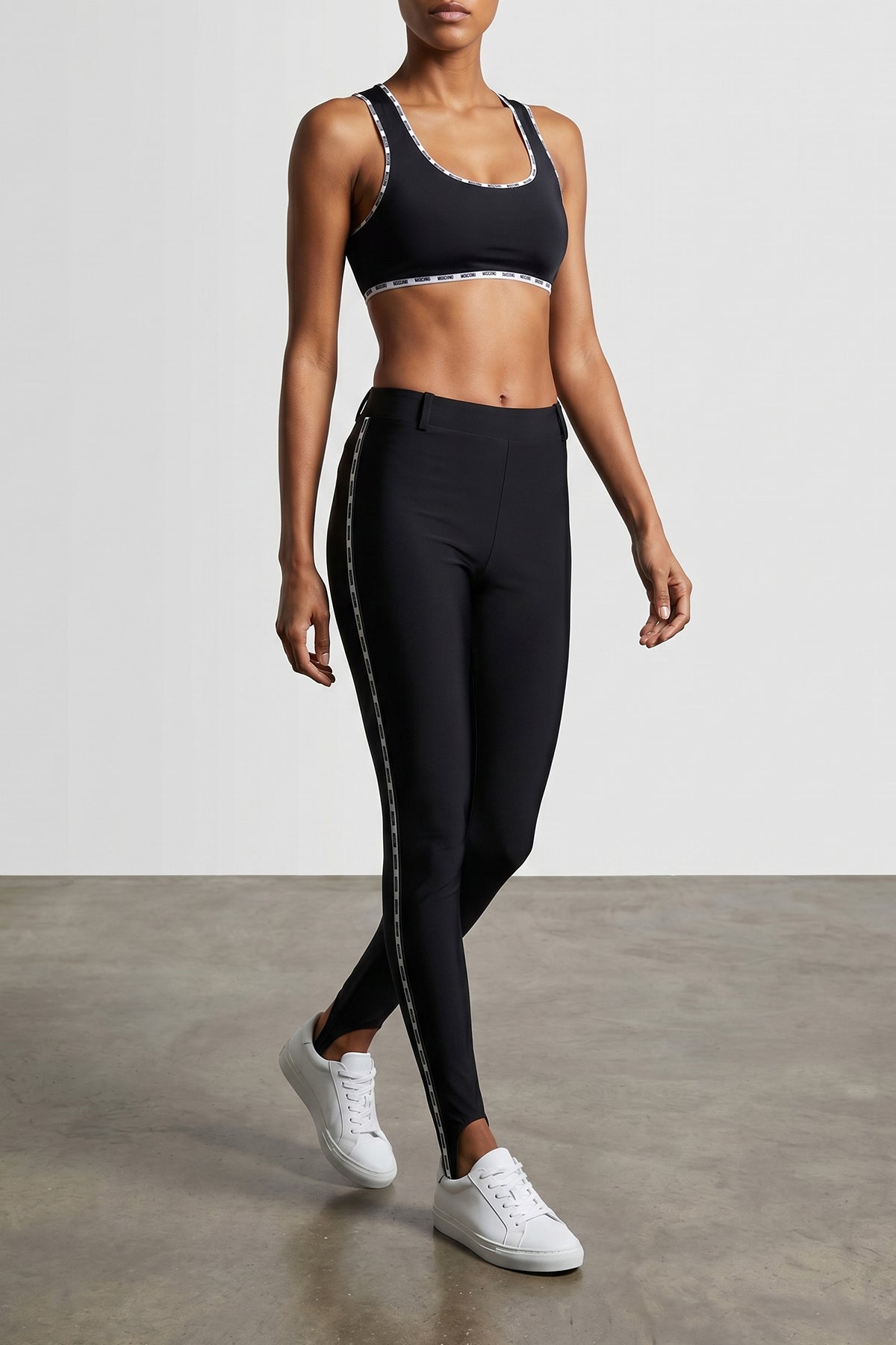 the sporty top moschino stands out for its slim silhouette and an essential de