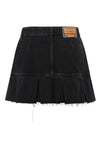 the de-reen diesel mini skirt redefines casual codes through a structured low-