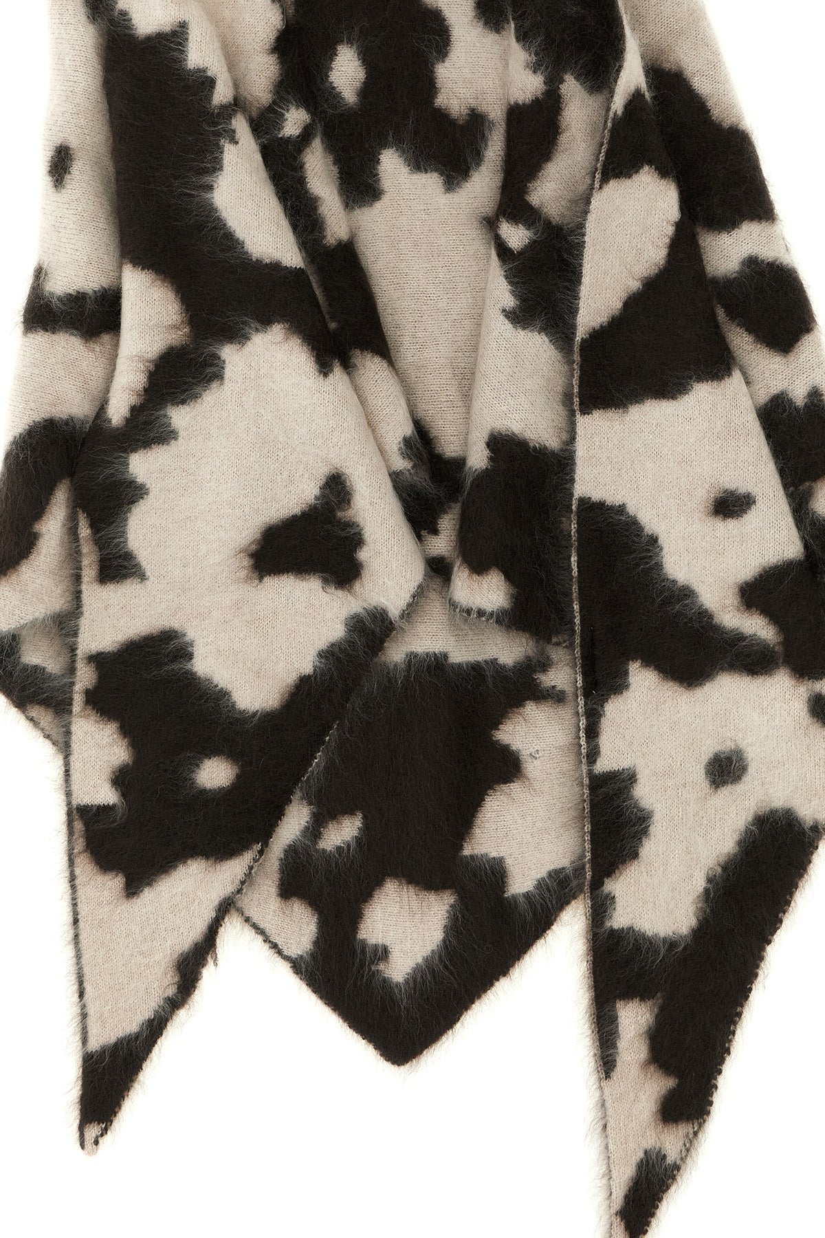 the guest in residence grizzly cowhide scarf reinterprets the western aestheti