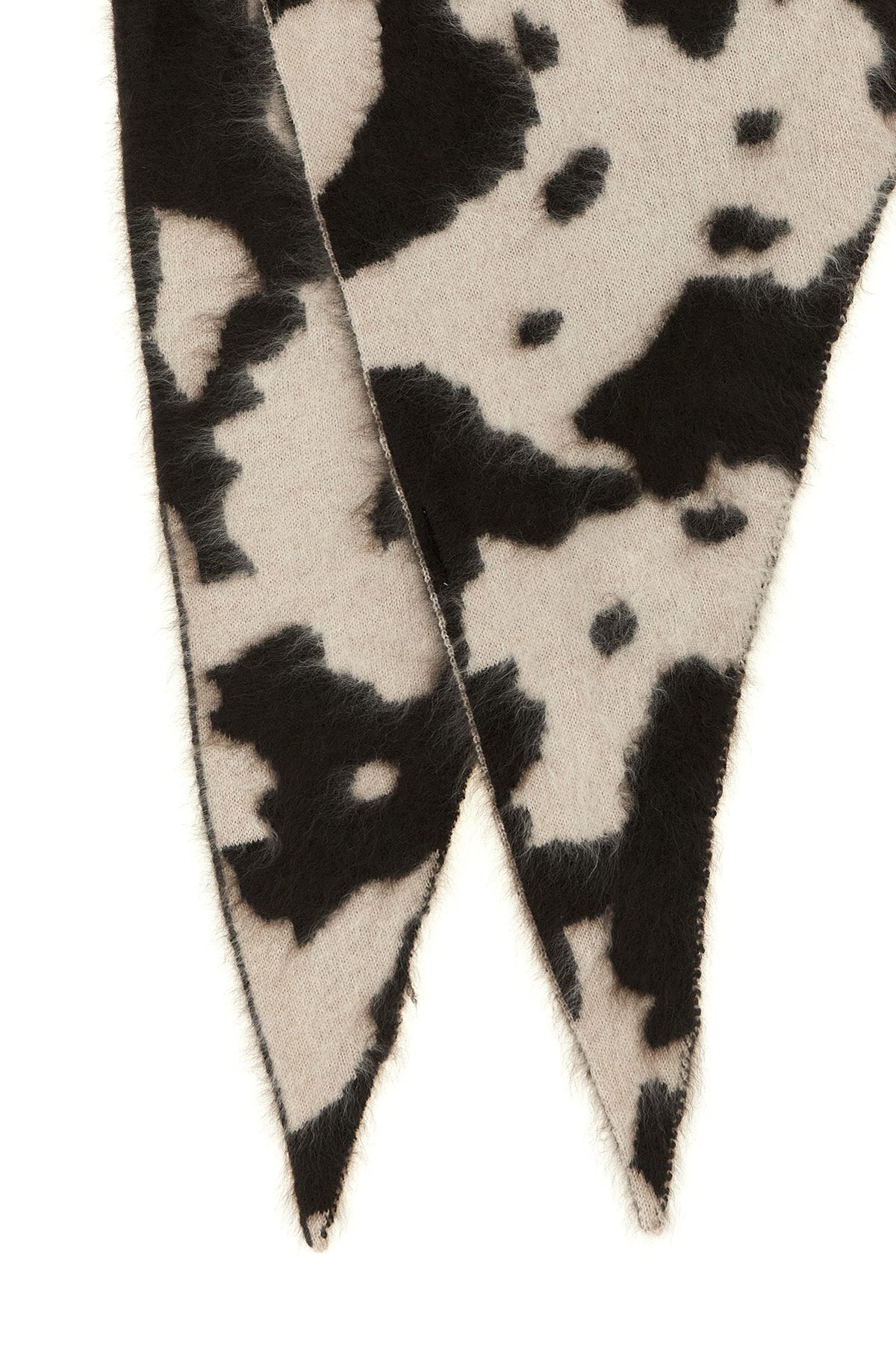 the guest in residence grizzly cowhide scarf reinterprets the western aestheti