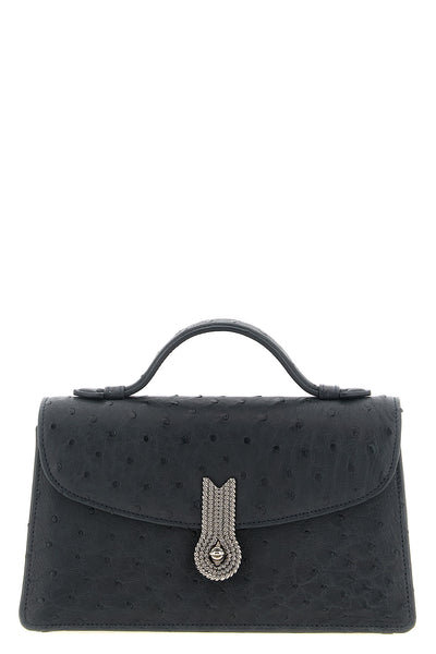 daniele amatos queen altrove handbag sets new standards of artisan luxury
