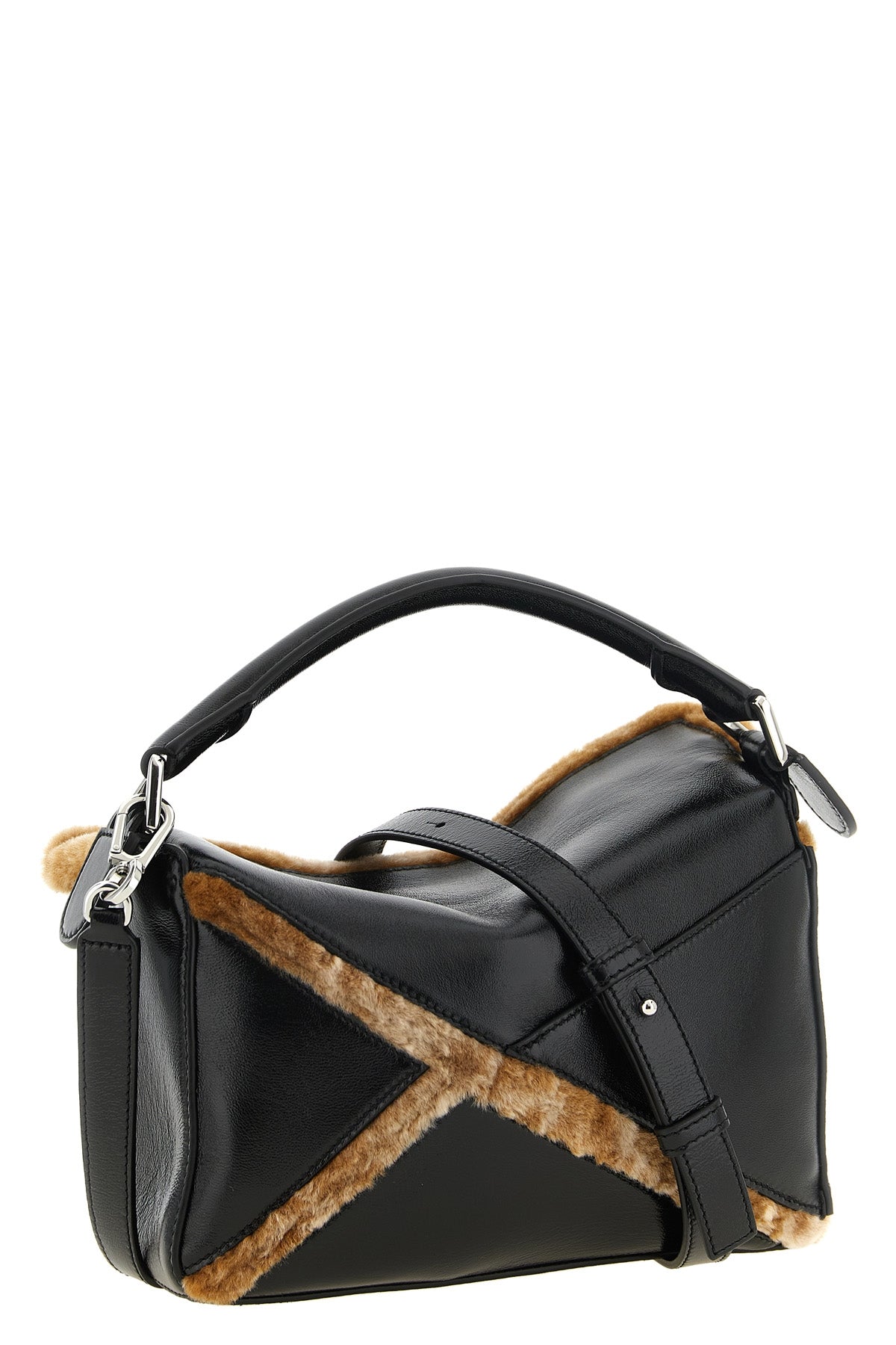 the loewe puzzle aviator small shoulder bag stands out for its iconic geometri