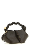 the ganni bou mini handbag redefines geometric volumes through a sculptural he