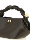 the ganni bou mini handbag redefines geometric volumes through a sculptural he