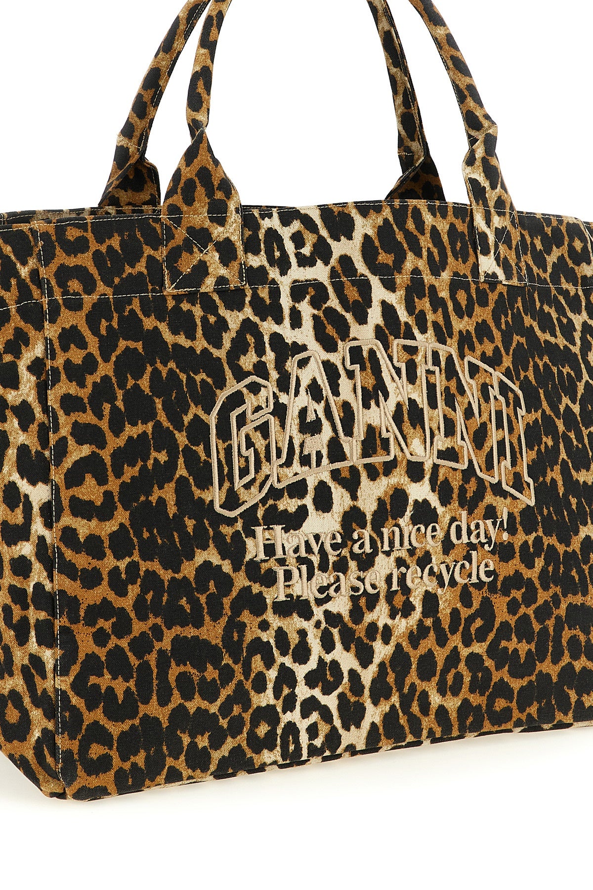 the ganni leopard xxl tote bag sets new standards for everyday accessories thr