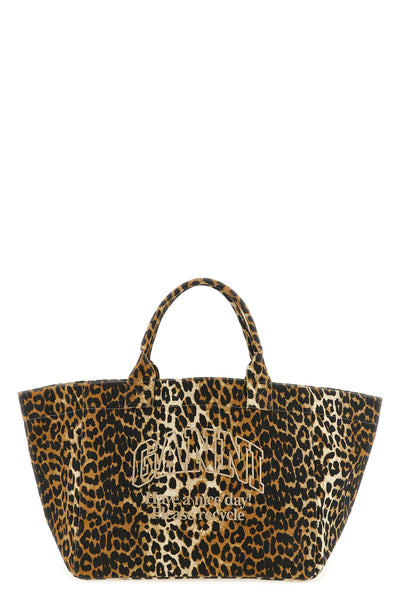 the ganni leopard xxl tote bag sets new standards for everyday accessories thr