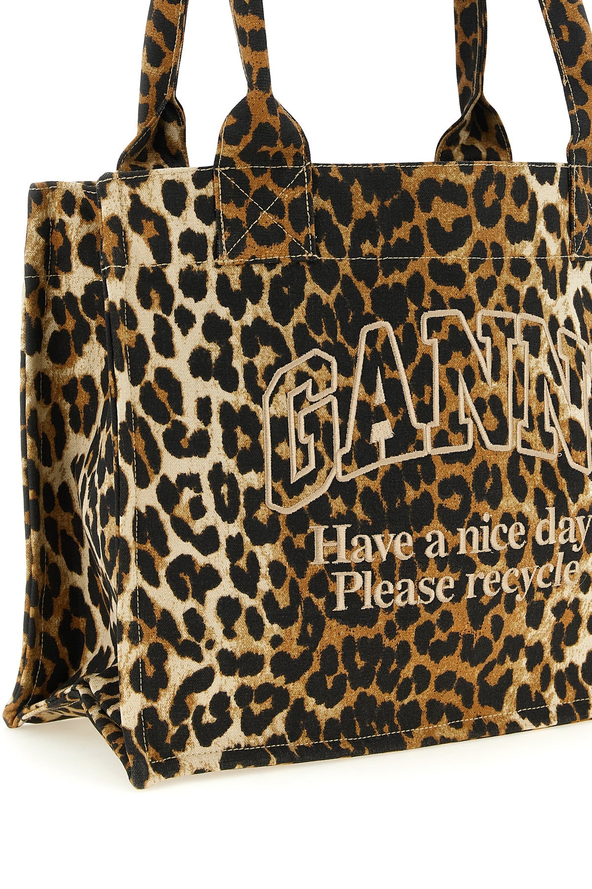 the large ganni leopard tote bag features a capacious silhouette made of cotto