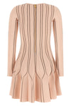 the elisabetta franchi knitted mini dress defines the silhouette through a play