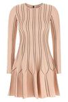 the elisabetta franchi knitted mini dress defines the silhouette through a play