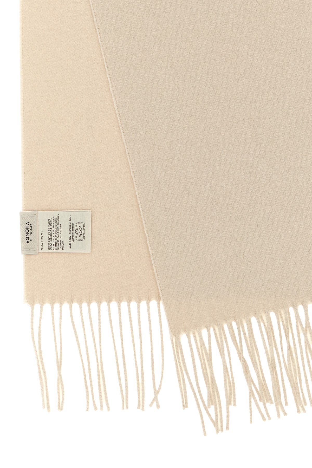 the agnona silk and cashmere blend scarf sets a new standard of tactile luxury