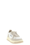 the autry medalist low sneakers anchor their design to a precise tennis aesthe
