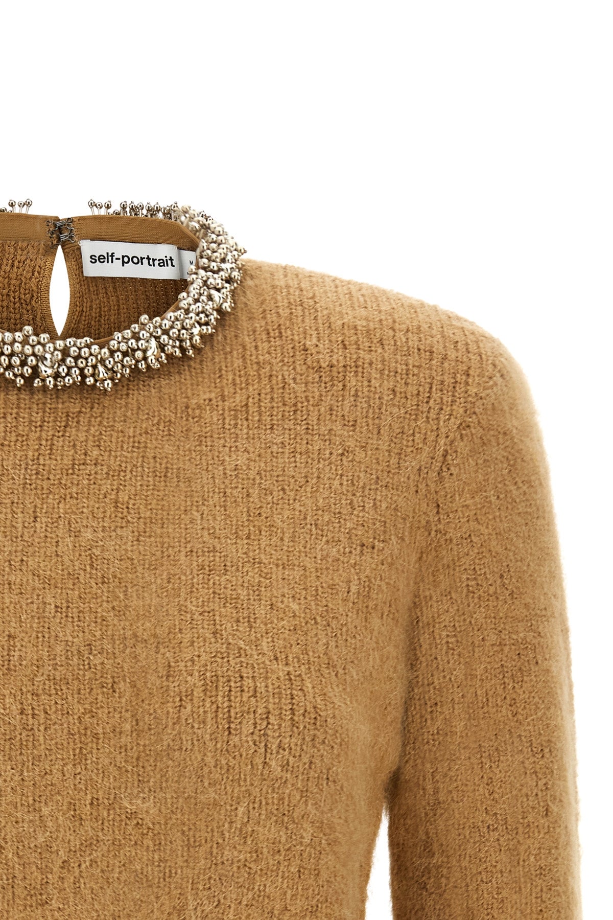 the self-portrait crewneck sweater redefines everyday elegance through a clever