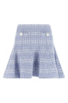 the self-portrait mini skirt features a flared pattern through rigorous structur