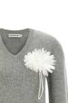 the self-portrait knit redefines classic knitwear through a romantic and structu