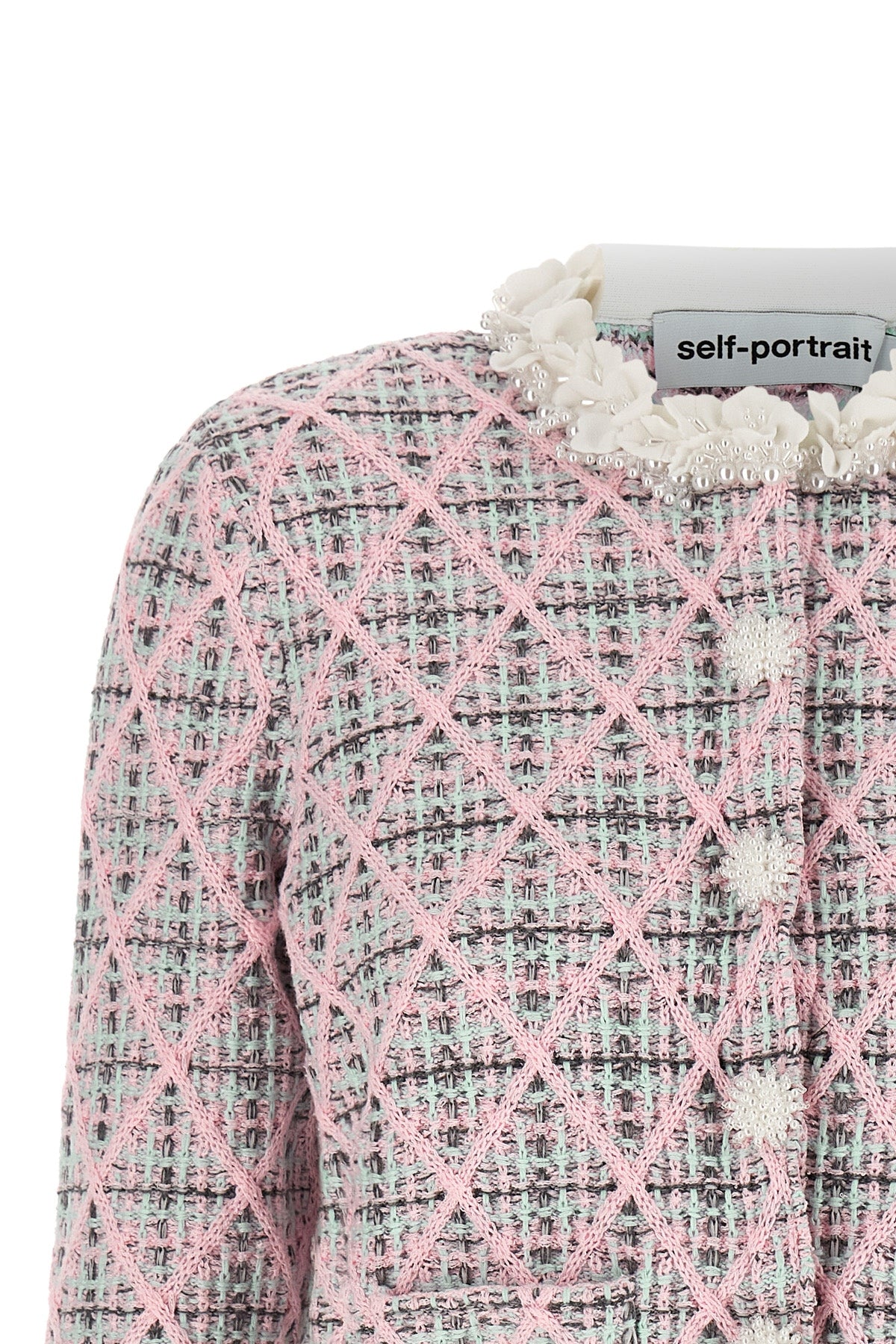 the self-portrait cardigan redefines everyday elegance through a cropped model