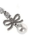 the self-portrait bow crystal charm pendant earrings feature a cascading metal