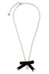 the black bow pearl necklace by self-portrait is structured on a continuous th