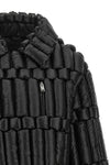 the biker-inspired down jacket raxxy redefines the volumes of outerwear through