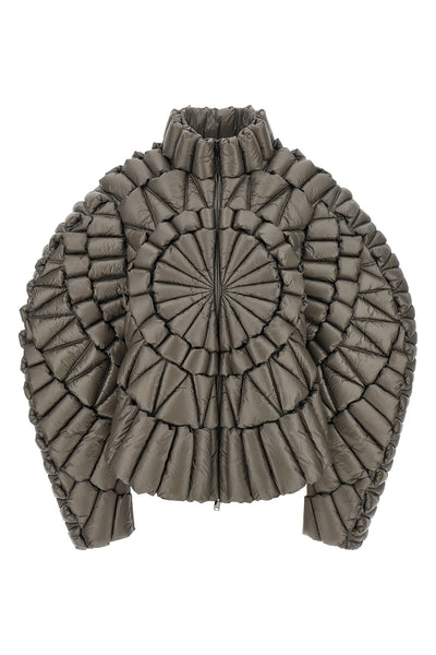 the raxxy down jacket redefines the volumes of outerwear through a complex three