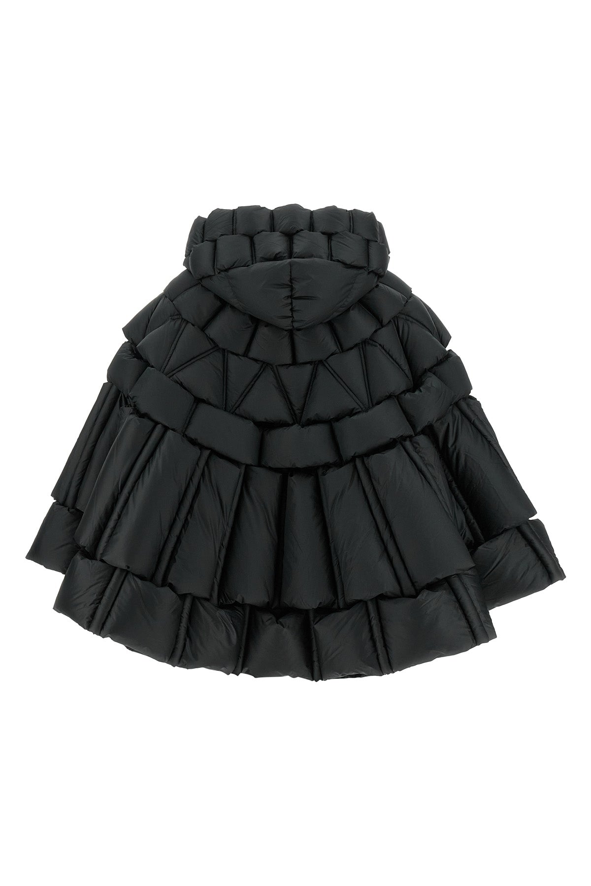 the raxxy cape redefines the volumes of outerwear through a complex three-dimens