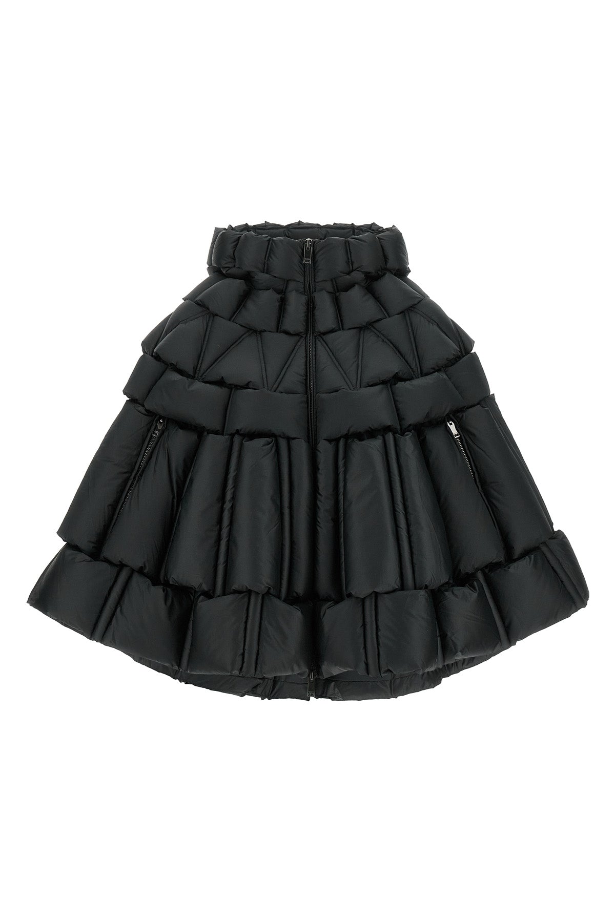 the raxxy cape redefines the volumes of outerwear through a complex three-dimens