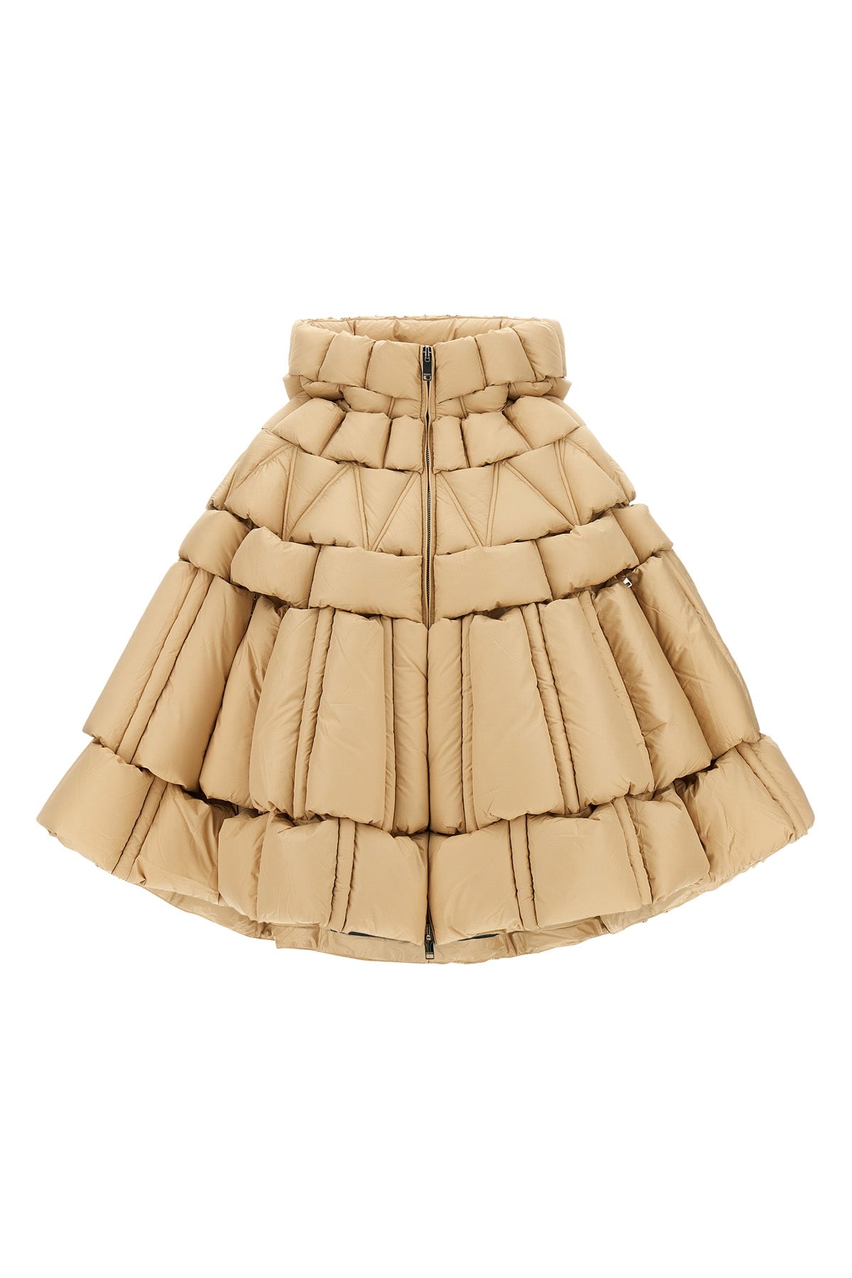 the raxxy cape redefines the volumes of outerwear through a complex three-dimens