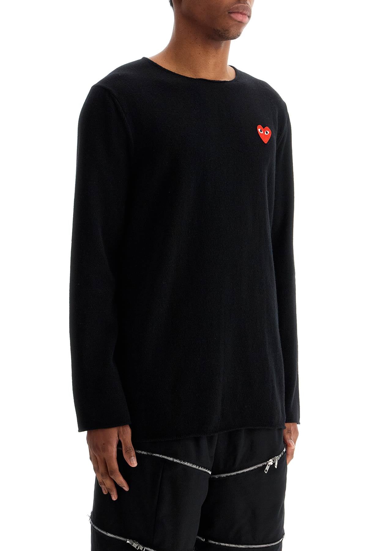 black wool sweater with red heart logo and wide neck