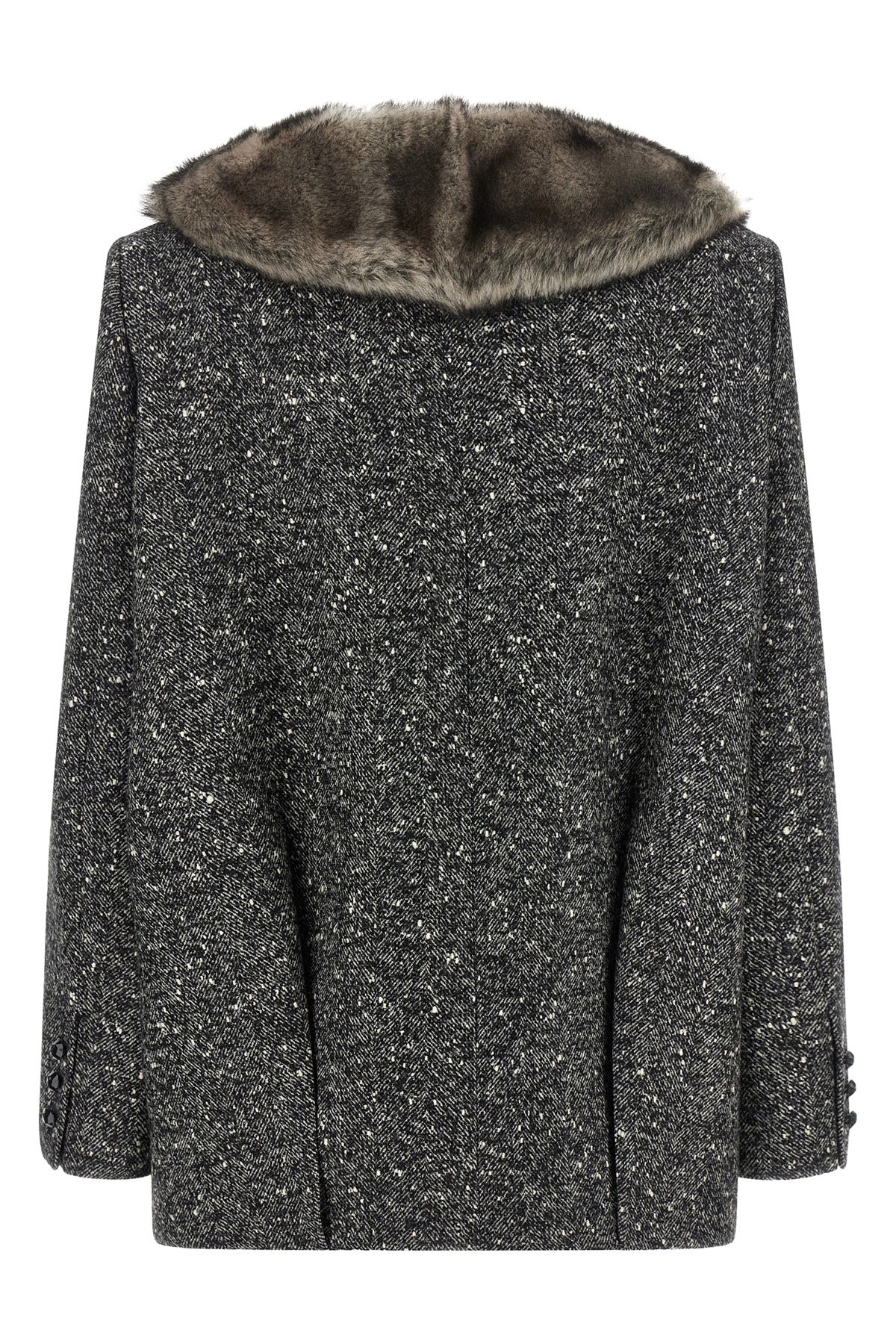 the valentino garavani mossi caban redefines the codes of outerwear through an