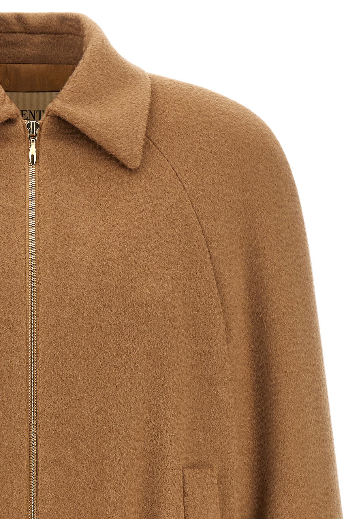 the valentino garavani caban redefines the codes of outerwear through a structur