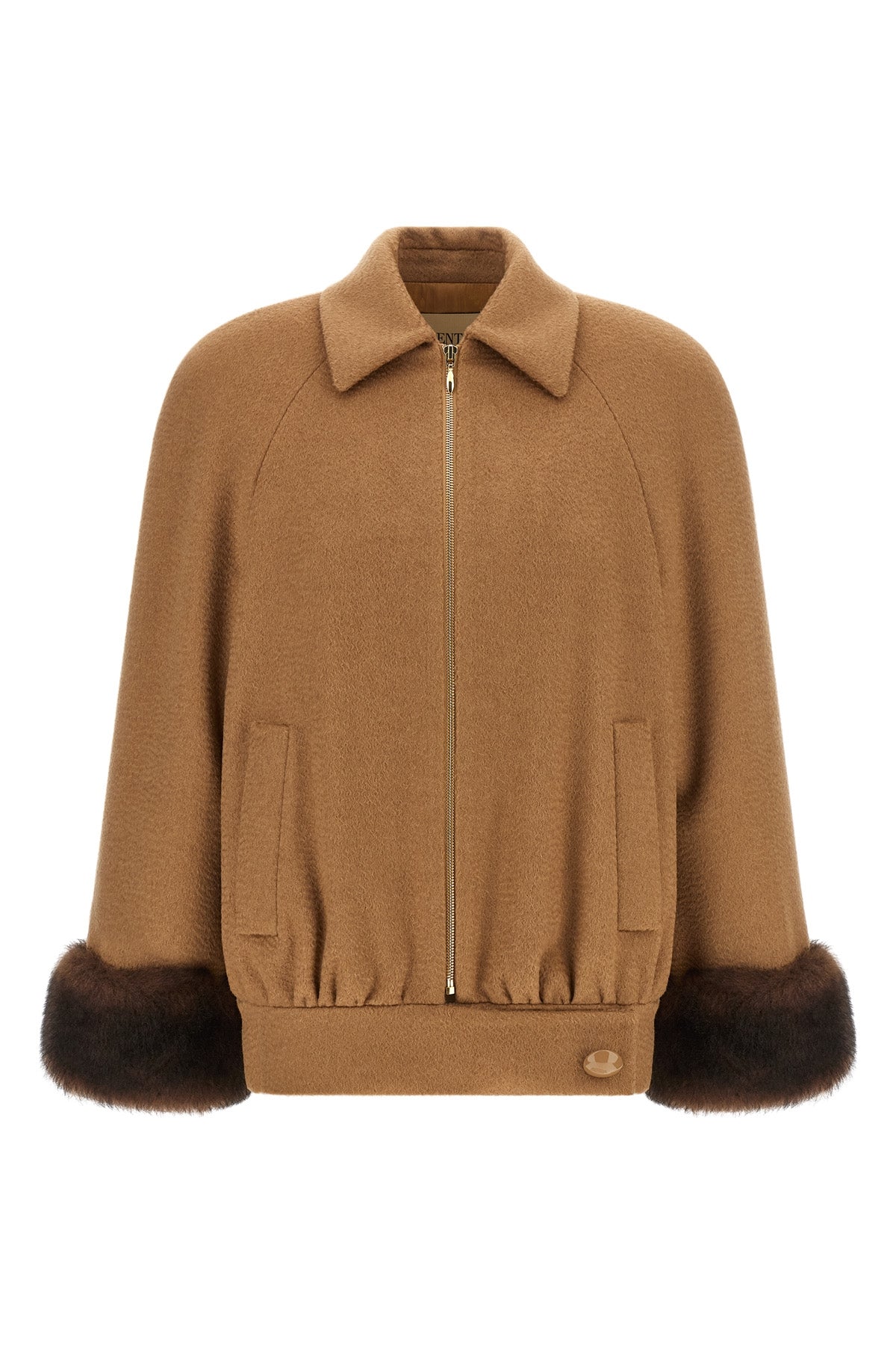 the valentino garavani caban redefines the codes of outerwear through a structur