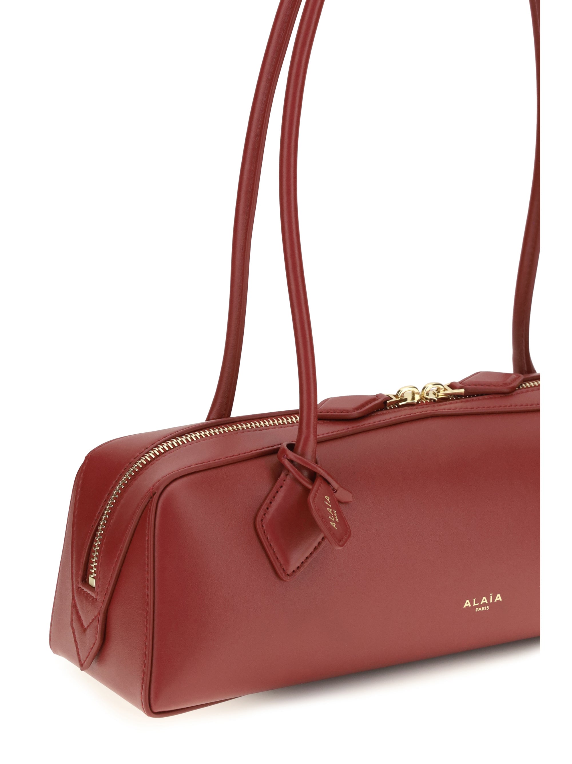 small le teckel shoulder bag
