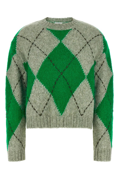 the ballantyne sweater redefines classic knitwear through contemporary volumes a