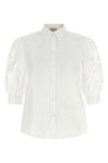 the valentino garavani cotton poplin shirt redefines classic tailoring through i