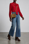 the valentino garavani bow shirt features a fluid tailored silhouette