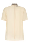 the valentino garavani short-sleeved top is made of fine crêpe de chine silk