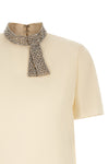 the valentino garavani short-sleeved top is made of fine crêpe de chine silk