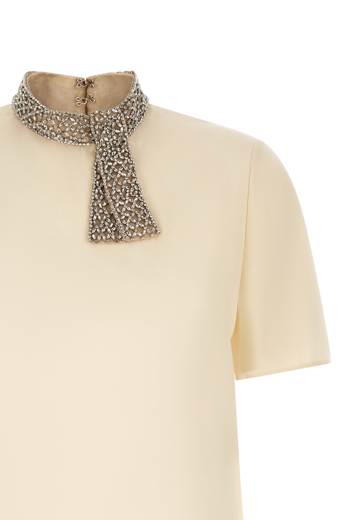the valentino garavani short-sleeved top is made of fine crêpe de chine silk