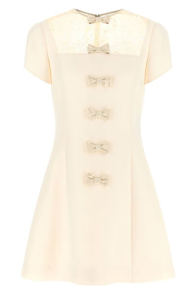 the valentino garavani mini dress expresses a refined sartorial vision through a