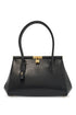 black calfskin handbag with snap closure