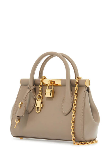 taupe leather handbag with lock