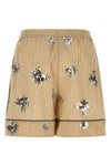 the bermuda shorts le twins sole redefine casual tailoring through meticulous