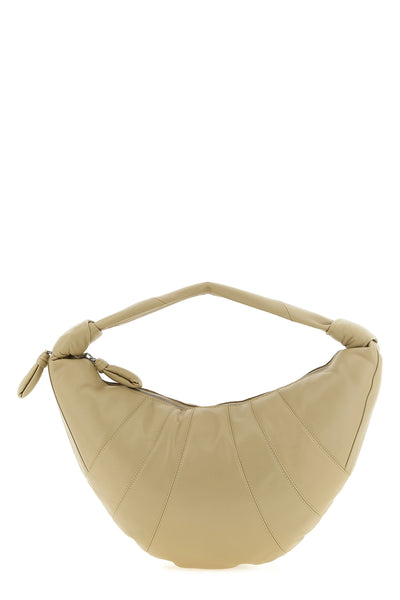 the lemaire fortune croissant shoulder bag defines a half-moon silhouette stru