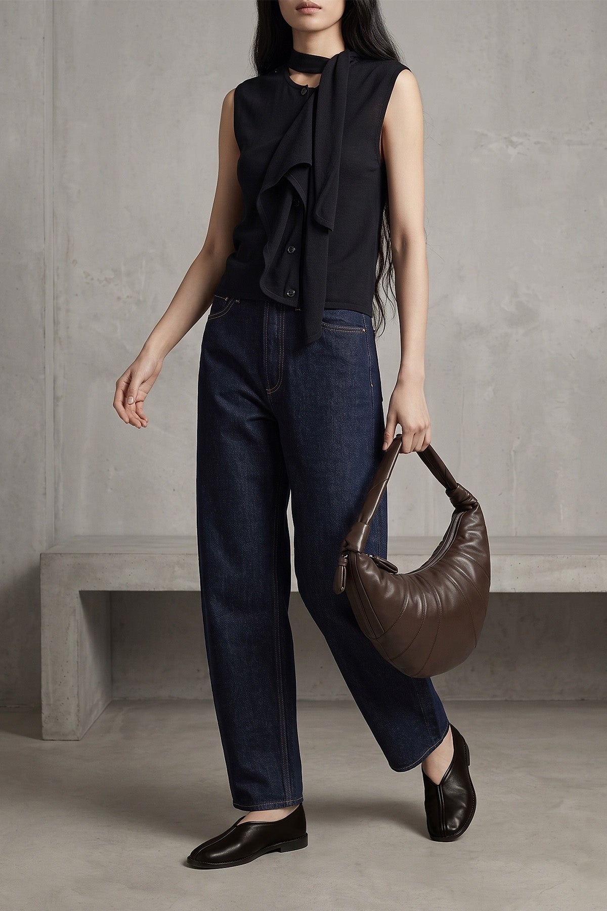the lemaire fortune croissant shoulder bag redefines geometric volumes through