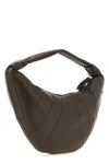 the lemaire fortune croissant shoulder bag redefines geometric volumes through