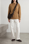 the lemaire croissant medium shoulder bag defines the codes of contemporary luxu