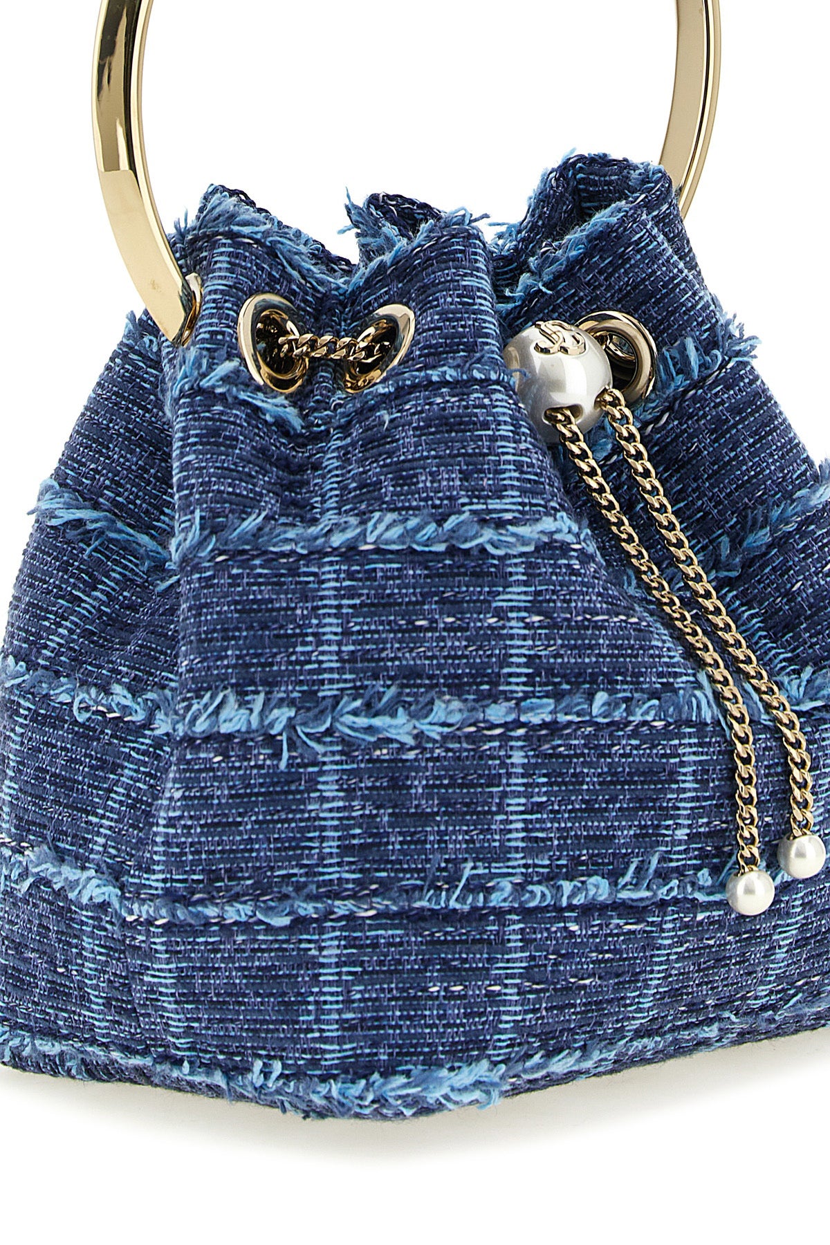the jimmy choo bucket bag features a structured silhouette made of compact denim