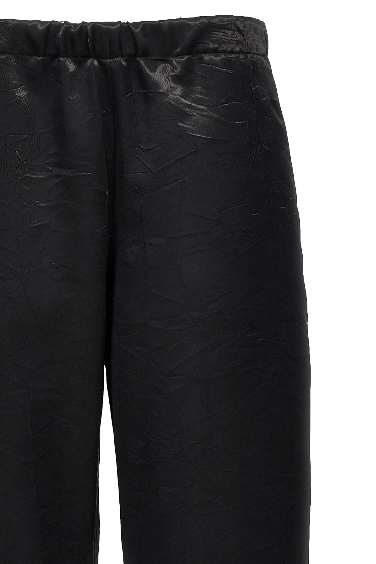 shiny fabric trousers
