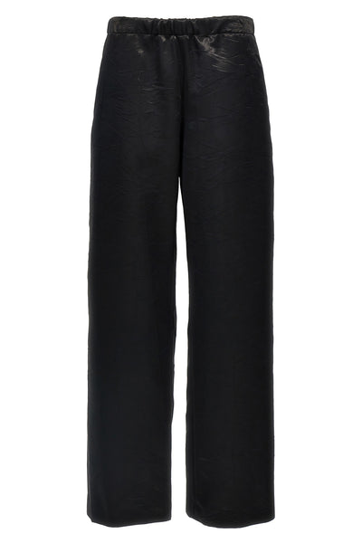 shiny fabric trousers