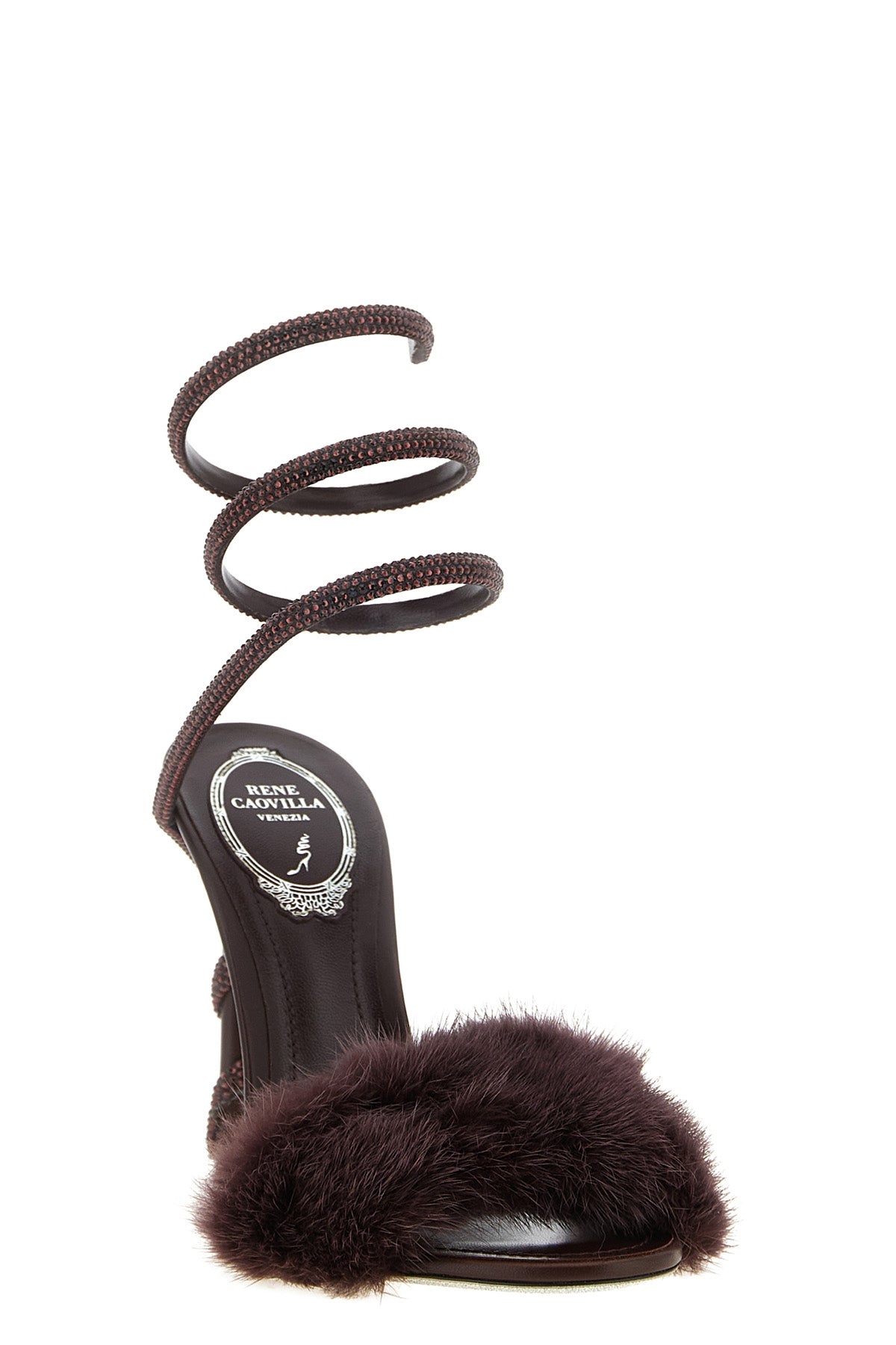 the rené caovilla cleo sandal redefines the codes of evening footwear through